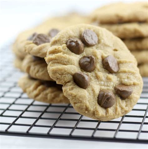 3 ingredient cookie - Using a small rounded spoon or your finger, make a dent in the middle of each rolled out shape. Bake in a preheated oven of 356°F / 180°C for 10 minutes. Remove from the oven and place the cookies on a wire rack. Allow to …